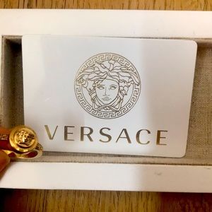 Versace gold ring. Size 6.